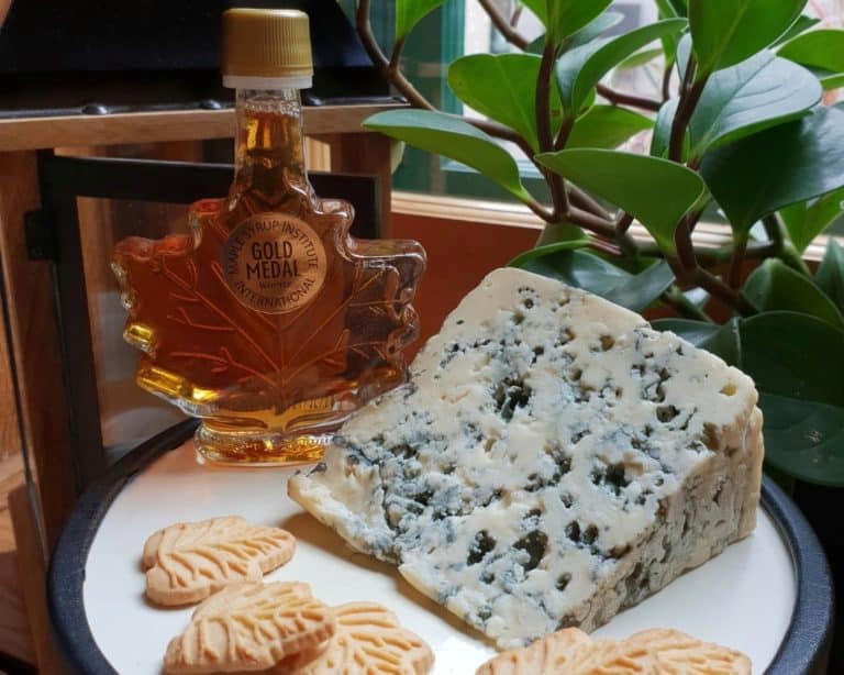 Wedge of Bleu d'Elizabeth cheese with maple syrup and maple cookies