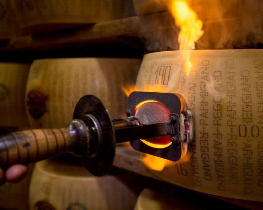 Hot iron used by affineur to brand Parmigiano Reggiano