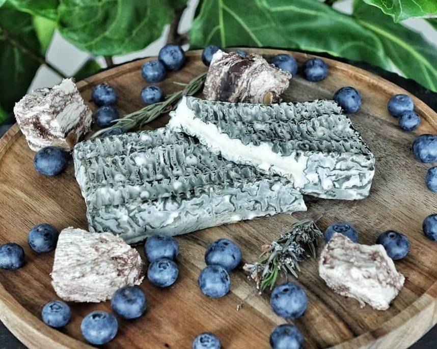 Brick of Buffalo Blue with blueberries