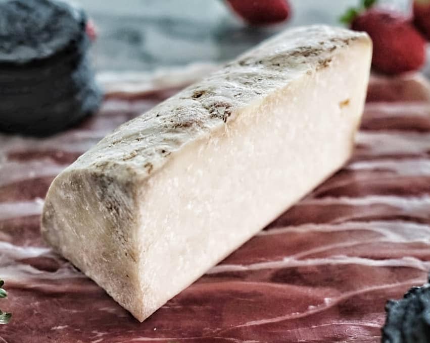 Hard Milawa Tomme with a rugged natural rind