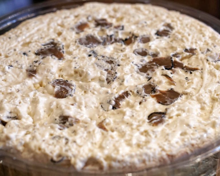 Decadent soft blue cheese Cremoso al Tartufo topped with shaved black truffle