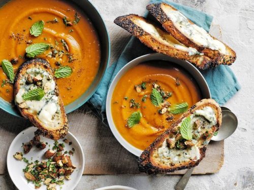 Baked Sweet Potato Soup with Gorgonzola Dolce on table