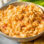 Bowl of creamy orange Pimento Cheese